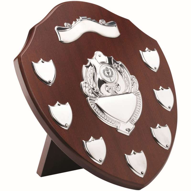 MAHOGANY SHIELD WITH CHROME FRONTS AND 7 RECORD SHIELDS (1in CENTRE) – 11in